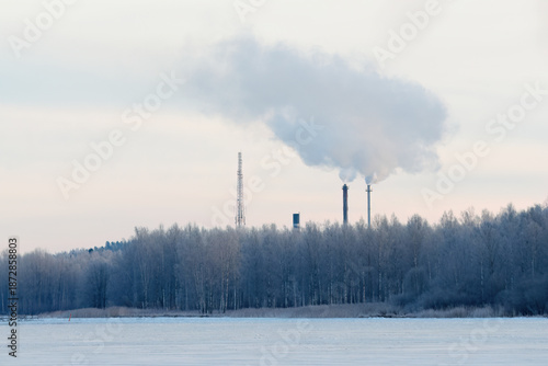 A landscape with smoking factory pipes