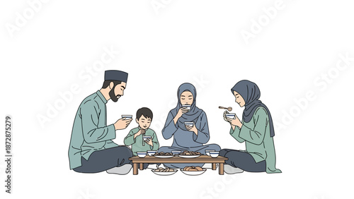 Family having breakfast together at a low table