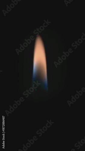 candle flame with dark background, vertical footage background
