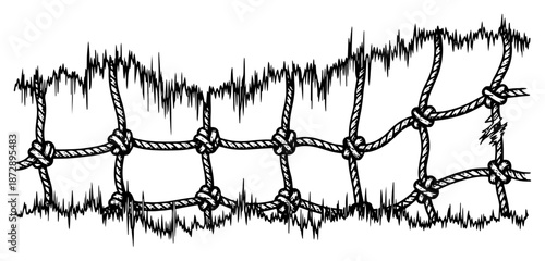 Knotted rope cargo net fencing covered with wild grass