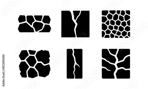 Collection of cracked earth and stone patterns in black and white vector graphics