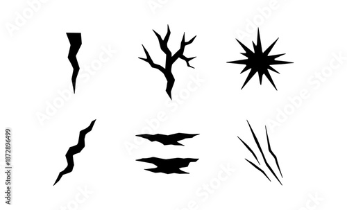 Collection of black abstract graphic elements representing damage and destruction