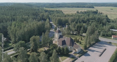 Aerial view of Hausjärvi church and surroundings in sunny summer weather, Hausjärvi, Finland.