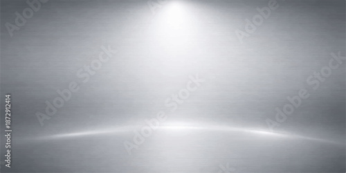A sleek industrial backdrop featuring a shiny brushed metal plate texture with a silver stainless steel surface and grey metallic aluminum pattern reflecting light across the textured wall