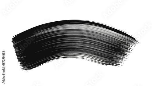 A black mascara brush stroke on a white background, showing the texture and application of the cosmetic.