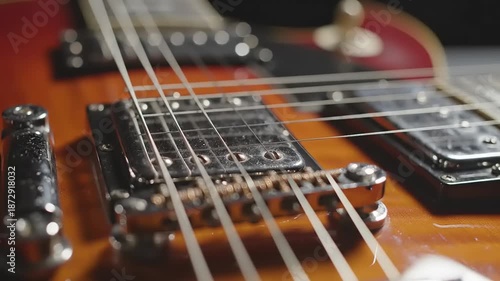 Wallpaper Mural Close up of electric guitar details showing strings bridge and body Torontodigital.ca