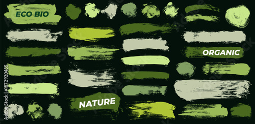 Organic green straight brush tags with rough hand drawn texture. Grunge green long brush strokes. Bold organic smears, handmade strokes for eco labels, stickers, highlights, natural design elements.