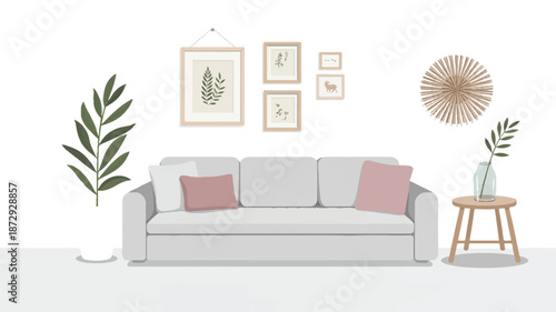 A gray couch with pink pillows and plants in a cozy living room setting with framed pictures on the wall
