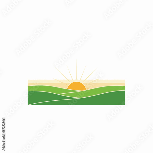 Small sunrise over green hill strip