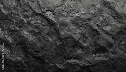 Black or Dark Gray Rough Grainy Stone Texture Background