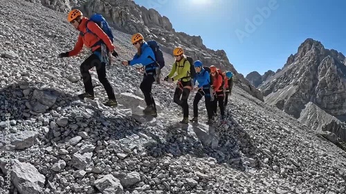 Mountain Climbing Team Hiking Rocky Slope Adventure Ascent Mountaineering Expedition Outdoor Travel Backpacking Trekking Summit Challenge Active Lifestyle Exploration High Angle View