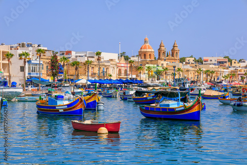 Traditional fishing boats in the Mediterranean Village of Marsaxlokk, Malta