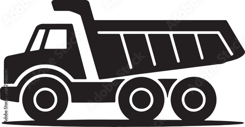 Side view silhouette of large construction dump truck for hauling dirt material aggregate or heavy load transportation