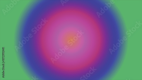 A vibrant gradient of colors forming a circular blurred shape