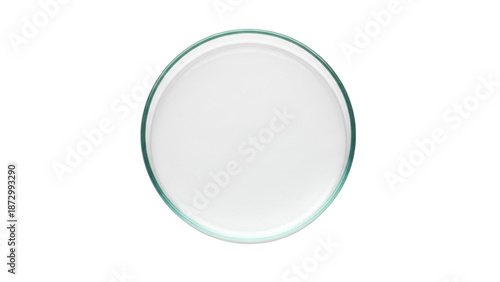 Clear glass petri dish with white opaque liquid and green rim isolated on a transparent background image