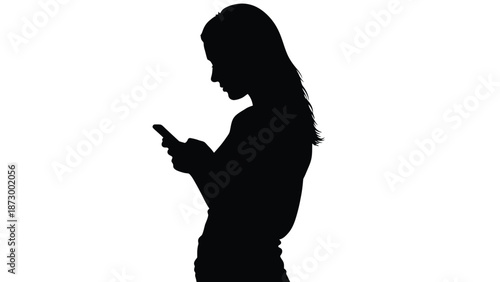 Silhouette profile view of a young woman focused intently while holding and interacting with a modern smartphone device against a stark white background