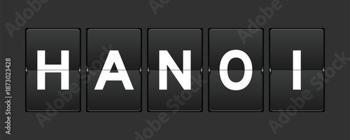 Black color analog flip board with word hanoi on gray background