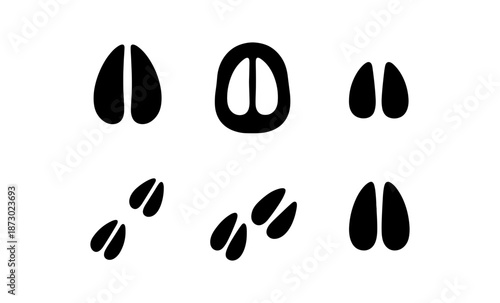 Collection of black animal hoof prints on a white background