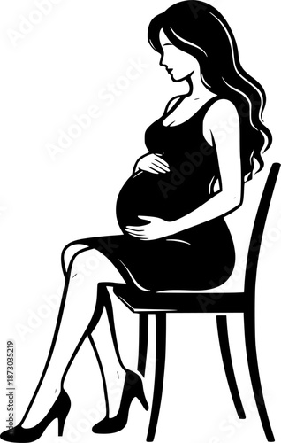 pregnant woman sitting on a chair
