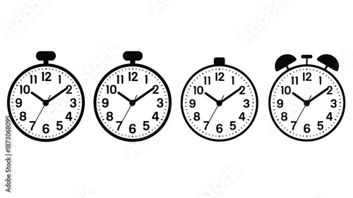 Black and white analog alarm clocks side by side showing same time