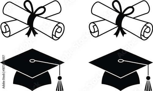Black graduation caps and rolled diplomas with ribbons