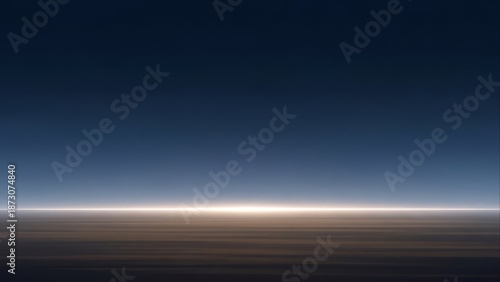 Stratospheric view of the glowing horizon line above layered clouds during twilight or dawn, showcasing the upper atmosphere and the curvature of the Earth.