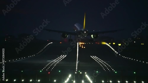 Commercial Twin-Engine Passenger Aircraft Landing in Strong Crosswinds at Night