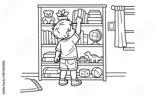 Young boy reaching for a book on a shelf filled with toys and books