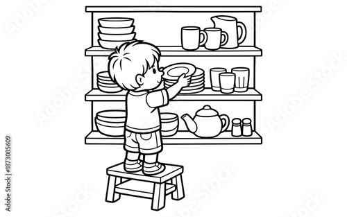 Young boy standing on a stool reaching for plates on a kitchen shelf