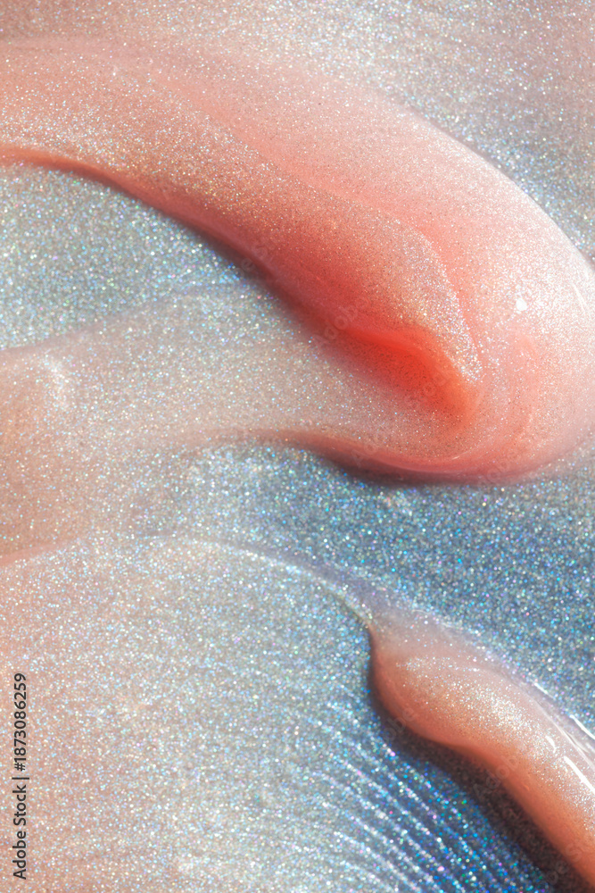 Fototapeta premium Light pink red liquid makeup smear of creamy luminous body lotion, shower gel, high lighter luminizer sparkle on black background