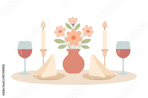 Setup of a dinner table with flowers, candles, and plates of cheese at home during evening time