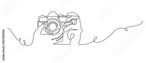 line drawing of a camera. Linear style and hand drawn photo camera.Vector illustration, outline