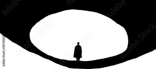 Silhouette of lone figure in dramatic black and white abstract landscape