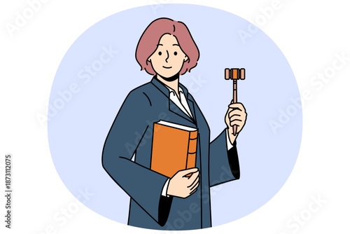 Woman judge with wooden claw and constitution in hands is ready to announce fair legal decision. Girl in judge robe smiles, rejoicing in building successful career in field of law.