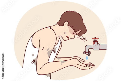 Emaciated guy near faucet with dripping water is trying to survive during drought and wash or saved from thirst. Problem of drought and lack of access to fresh water causing ecological disaster