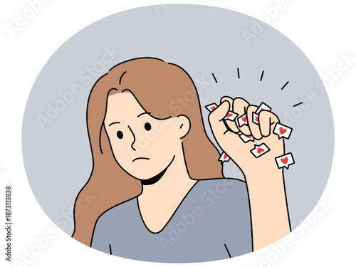 Woman struggles with social media addiction and clenches heart icons in fist to protest against digital slavery. Unfortunate girl became victim of internet addiction needs digital detox
