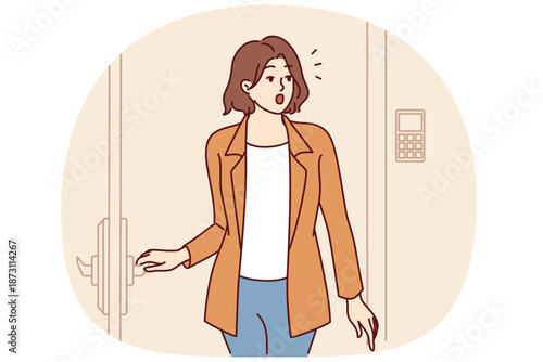 Woman enters hotel room and marvels at nice interior of temporary accommodation booked for vacation or weekend. Girl tourist stands at door of hotel apartment and looks around in surprise