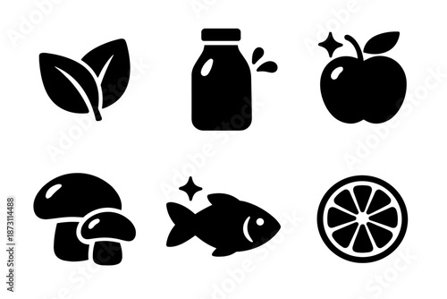 Grocery food icon collection in black. Set of leaves, milk bottle, apple, mushrooms, fish, citrus slice