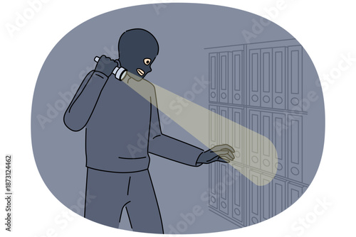 Spy steals documents and confidential data from office using flashlight and wearing mask to hide face from cameras. Spy breaks law to obtain insider information from corporations books.