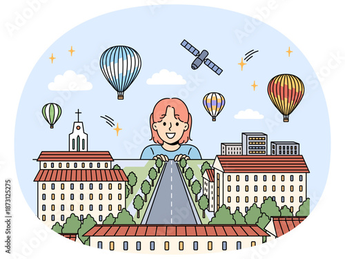 Little girl admires layout of city with miniature buildings and empty road, and dreams of going on trip. Architectural model of beautiful city near child who wants to visit it on vacation