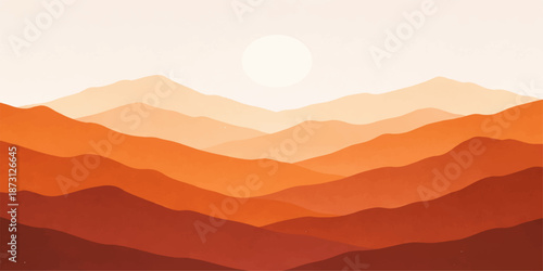A beautiful sunset orange light glows over the silhouette of misty mountain hills under a red cloudy sky at dawn