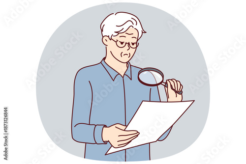 Experienced businessman is checking legal contract using magnifying glass to read fine print. Elderly man holds document and carefully studies all clauses of contract before signing or sealing