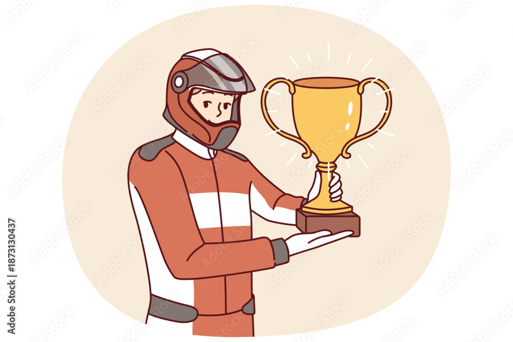 Fototapeta premium Man racer with golden cup for winning tournament rejoices at receiving championship title in competition. Guy driver, participant in extreme races on cars, demonstrates trophy of racer