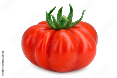 ribbed ripe beefsteak tomato isolated on white background, single fresh wrinkled tomato variety