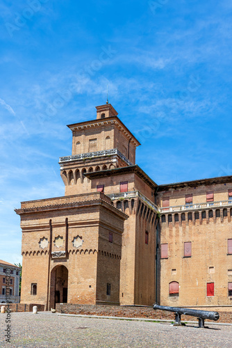 This impressive cannon stands at Castello Estense, Ferrara, highlighting the historical significance of the fortress. Ferrara, Emilia-Romagna, Italy.