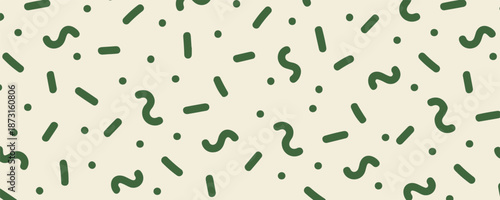 Abstract cream background with random green letters