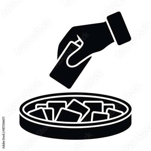 Black vector silhouette of hand dropping ballot into box for election