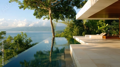 A luxury outdoor pool with infinity edges overlooking the ocean.