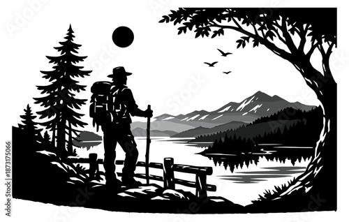Silhouette of hiker amid serene mountain landscape by lake at sunset