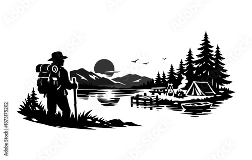 Silhouette of camper by lake with tent and mountains at sunset